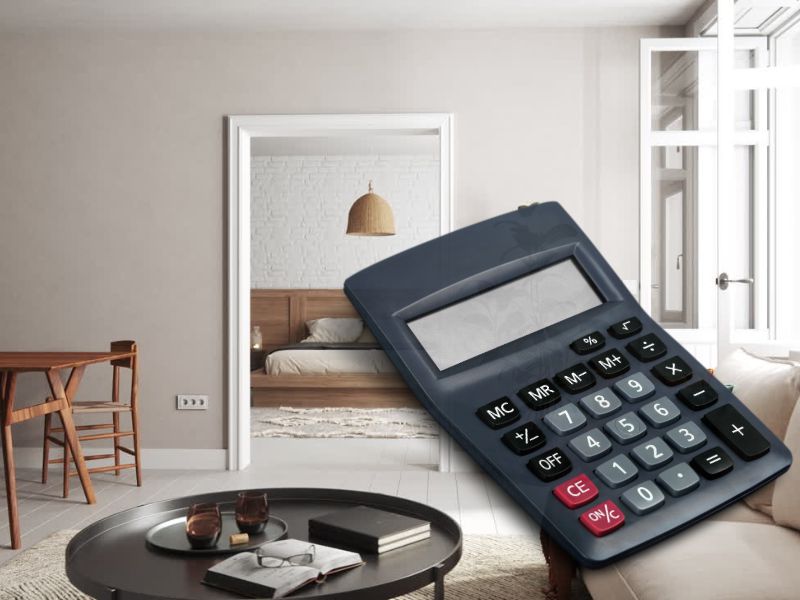 prikaz dnevne sobe stana i kalkulator