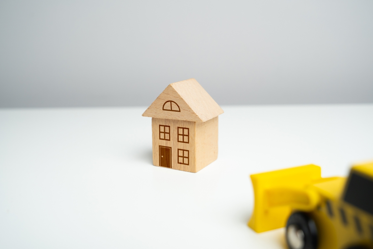 prikaz kuće i bagera